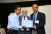 Dr. Nagib Callaos, General Chair, giving Dr. A. K. Gardezi the best paper award certificate of the session "Applications of Informatics and Cybernetics in Science and Engineering". The title of the awarded paper is "Organic Matter Effect on Glomus Intrarradices in Beans (Phaseolus Vulgaris L.) Growth Cultivated in Soils with Two Sources of Water under Greenhouse Conditions."
